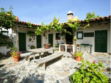 Ferienhäuschen mit Patio, Garten